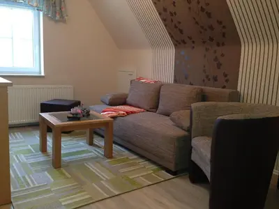 Ein Sitzbereich in der Unterkunft Ferienwohnung Hellerling