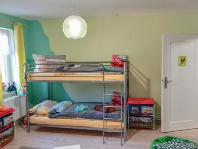 Ein Bett oder Betten in einem Zimmer der Unterkunft Bines