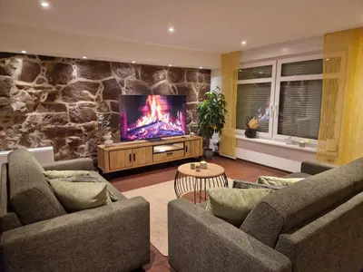 Ein Sitzbereich in der Unterkunft Ferienwohnung Zum Alten Cafè