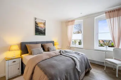 Ein Bett oder Betten in einem Zimmer der Unterkunft Osterallee Apartment