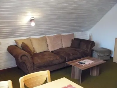 Ein Sitzbereich in der Unterkunft Haus Vier Jahreszeiten