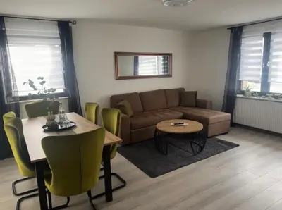Ein Sitzbereich in der Unterkunft Edelholz