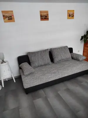 Ein Sitzbereich in der Unterkunft FeWo Waldblick