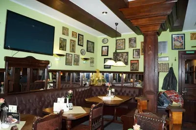 Ein Restaurant oder anderes Speiselokal in der Unterkunft Ratsstübchen