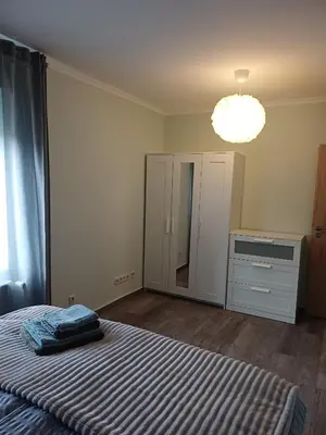 Ein Bett oder Betten in einem Zimmer der Unterkunft FeWo Sasa