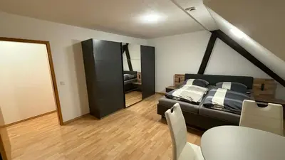 Ein Bett oder Betten in einem Zimmer der Unterkunft The Apartment Burgstrasse 6, Wernigerode