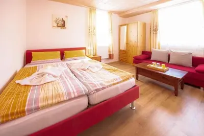 Ein Bett oder Betten in einem Zimmer der Unterkunft Pension und China - Thai Restaurant Asia - Haus
