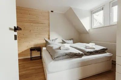 Ein Bett oder Betten in einem Zimmer der Unterkunft Harzcharlet Brockenbahn - Ganzes Haus