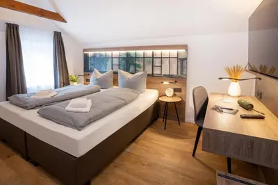 Ein Bett oder Betten in einem Zimmer der Unterkunft Lieblingsquartier 15