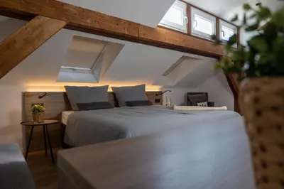 Ein Bett oder Betten in einem Zimmer der Unterkunft Lieblingsquartier 15