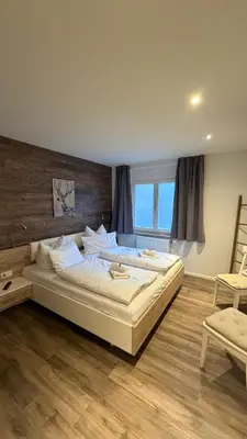 Ein Bett oder Betten in einem Zimmer der Unterkunft Mühls Apartments