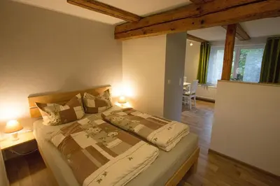 Ein Bett oder Betten in einem Zimmer der Unterkunft Ferienwohnung Alte Gärtnerei