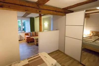 Ein Bett oder Betten in einem Zimmer der Unterkunft Ferienwohnung Alte Gärtnerei