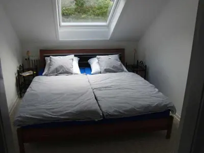 Ein Bett oder Betten in einem Zimmer der Unterkunft Ferienwohnung Haus Pietscher