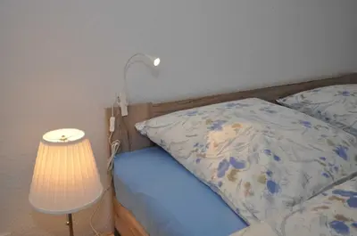 Ein Bett oder Betten in einem Zimmer der Unterkunft Ferienwohnung Martin I