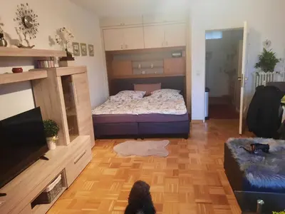 Ein Bett oder Betten in einem Zimmer der Unterkunft Ferienwohnung Schnuffi Wolfgang Kresse