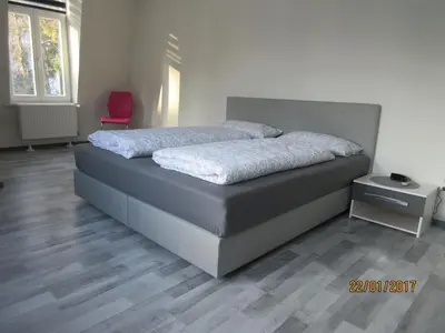 Ein Bett oder Betten in einem Zimmer der Unterkunft FeWo Witt - Annenburg