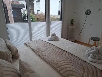 Ein Bett oder Betten in einem Zimmer der Unterkunft Ferienwohnung Bergblüte