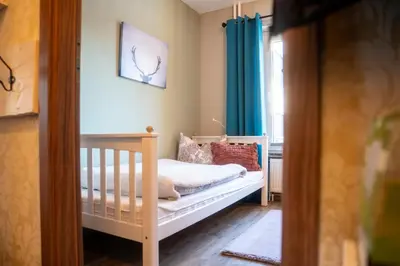 Ein Bett oder Betten in einem Zimmer der Unterkunft Bergliebe Braunlage