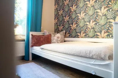 Ein Bett oder Betten in einem Zimmer der Unterkunft Bergliebe Braunlage
