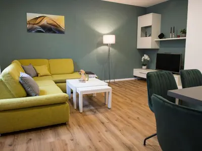 Ein Sitzbereich in der Unterkunft Apartment Kinas Suite EG by Interhome