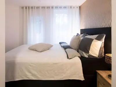 Ein Bett oder Betten in einem Zimmer der Unterkunft Apartment Kinas Harz Villa by Interhome