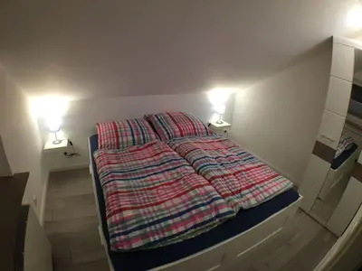 Ein Bett oder Betten in einem Zimmer der Unterkunft Apartment Moderne Ferienwohnung Mila in Braunlage by Interhome