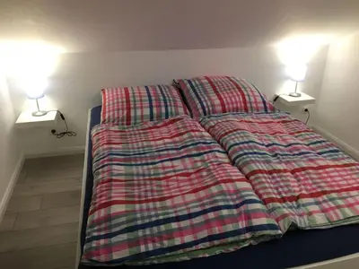 Ein Bett oder Betten in einem Zimmer der Unterkunft Apartment Moderne Ferienwohnung Mila in Braunlage by Interhome