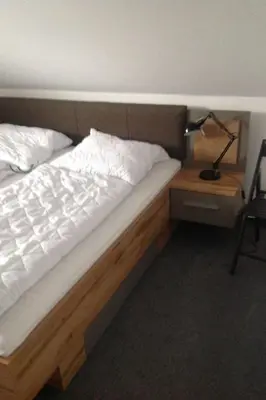 Ein Bett oder Betten in einem Zimmer der Unterkunft Apartment Hampton by Interhome