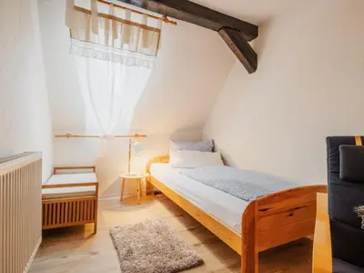 Ein Bett oder Betten in einem Zimmer der Unterkunft Holiday Home FH St- Andreasberg by Interhome