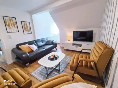 Ein Sitzbereich in der Unterkunft Apartment Wohnung in Goslar mit Grill und Terrasse by Interhome