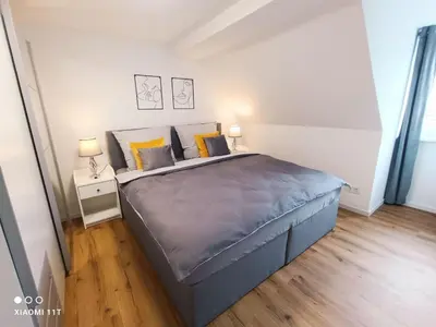Ein Bett oder Betten in einem Zimmer der Unterkunft Apartment Wohnung in Goslar mit Grill und Terrasse by Interhome