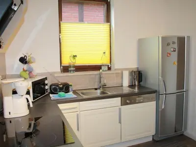 Küche/Küchenzeile in der Unterkunft Apartment in Wernigerode mit Grill und Garten by Interhome