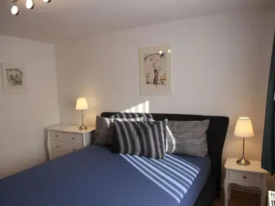 Ein Bett oder Betten in einem Zimmer der Unterkunft Apartment Wohnung Julius 1 - gemütlich und kinderfreundlich by Interhome