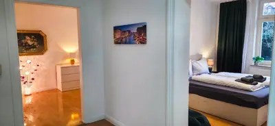 Ein Bett oder Betten in einem Zimmer der Unterkunft Großzügiges City-Apartment für 8 Gäste mit Parkplatz im Zentrum Wernigerode