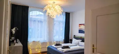 Ein Bett oder Betten in einem Zimmer der Unterkunft Großzügiges City-Apartment für 8 Gäste mit Parkplatz im Zentrum Wernigerode
