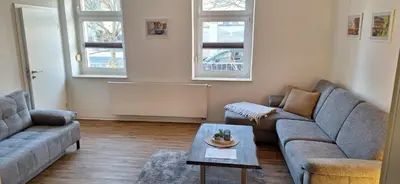 Ein Sitzbereich in der Unterkunft Ferienwohnung unter der Hammwarte