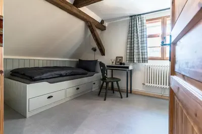 Ein Bett oder Betten in einem Zimmer der Unterkunft Villa Moock- gemütlich wohnen im Denkmal von 1766