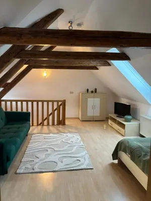 Ein Bett oder Betten in einem Zimmer der Unterkunft Altstadt-Loft Nova