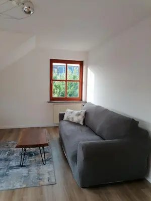 Ein Sitzbereich in der Unterkunft Ferienwohnung HarzErlebnis