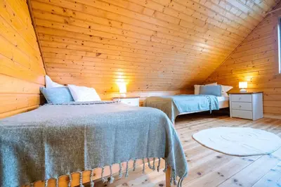 Ein Bett oder Betten in einem Zimmer der Unterkunft Feriendorf Blauvogel Blauvogel 36