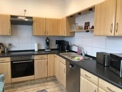 Küche/Küchenzeile in der Unterkunft Ferienhaus „Am Eichholz“ in Ilsenburg – Mit Garten, Sauna & Hund willkommen