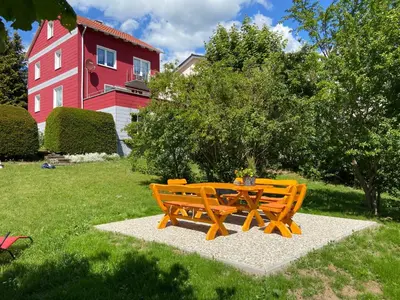 Ein Garten an der Unterkunft Ferienhaus SweetHome - eingezäunter Garten - 3 Hunde willkommen - ruhige Sackgasse