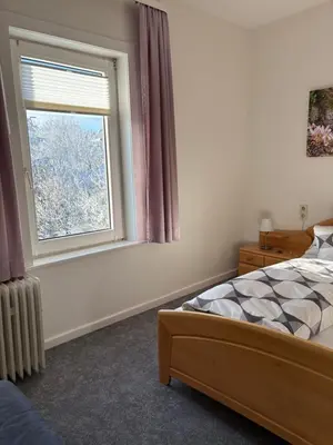 Ein Bett oder Betten in einem Zimmer der Unterkunft Eichhörnchenblick