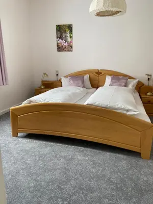 Ein Bett oder Betten in einem Zimmer der Unterkunft Eichhörnchenblick