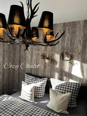Ein Sitzbereich in der Unterkunft Cozy Chalet