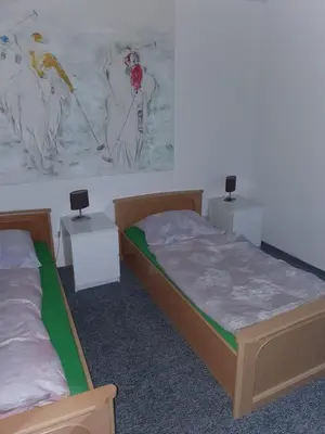 Ein Bett oder Betten in einem Zimmer der Unterkunft Ferienwohnung zur Apotheke