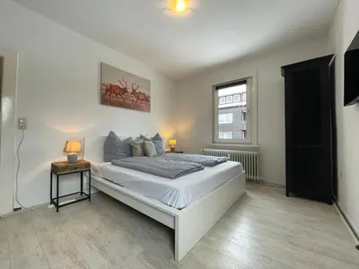 Ein Bett oder Betten in einem Zimmer der Unterkunft Hyggeliges Apartment 