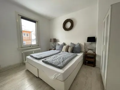 Ein Bett oder Betten in einem Zimmer der Unterkunft Hyggeliges Apartment 