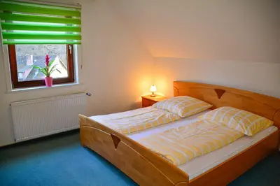 Ein Bett oder Betten in einem Zimmer der Unterkunft Ferienhaus am Lampersberg